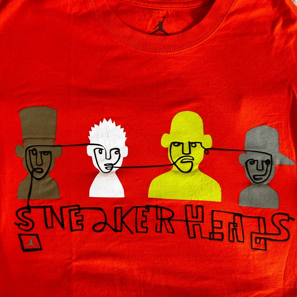 Jordan brand tshirt with “sneaker head” on front chest and jump man logo on back